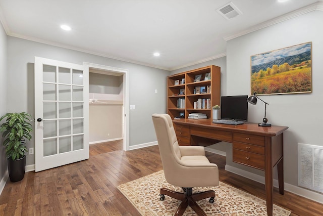 office area with dark hardwood / wood-style floors and ornamental molding