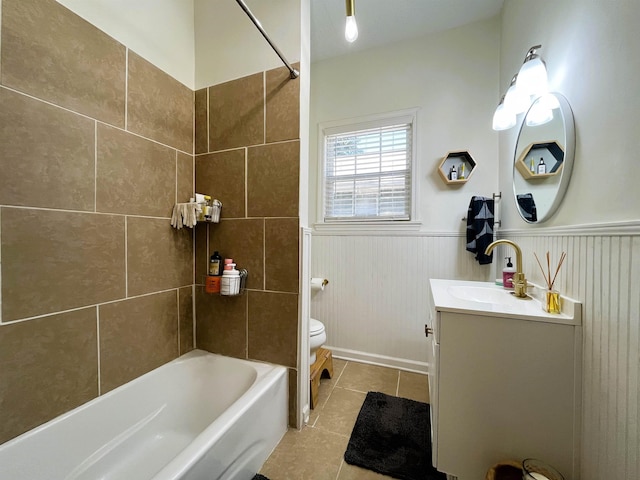 full bathroom with tile patterned floors, shower / washtub combination, vanity, and toilet