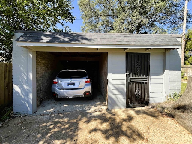 garage with a carport