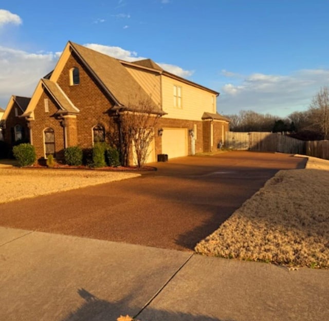 view of front of property with a garage