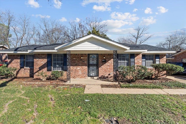 ranch-style home with a front yard