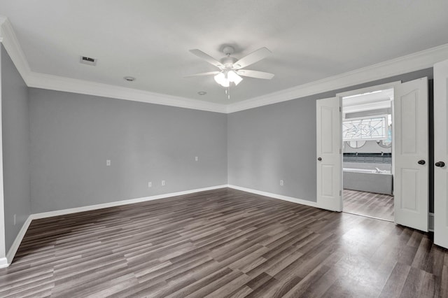 unfurnished bedroom featuring ceiling fan, crown molding, and dark wood-type flooring