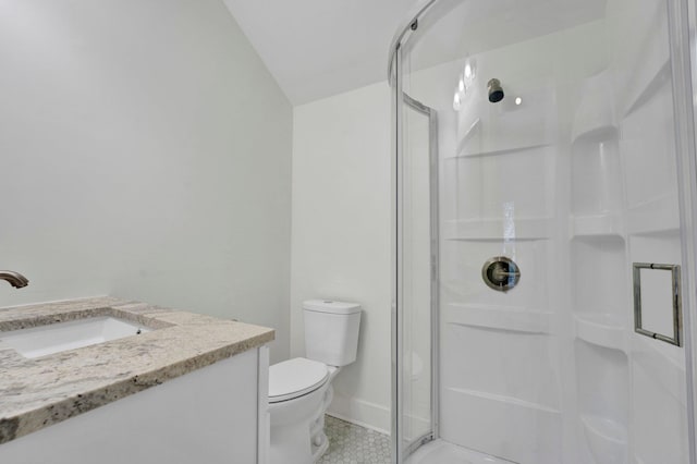 bathroom with vanity, toilet, an enclosed shower, and lofted ceiling