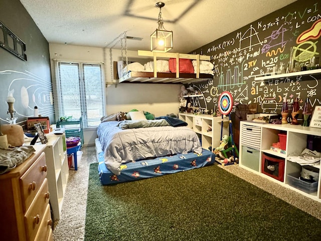 bedroom featuring a textured ceiling