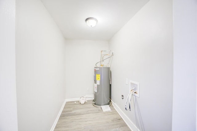 utility room featuring water heater