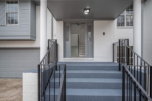 property entrance with a garage