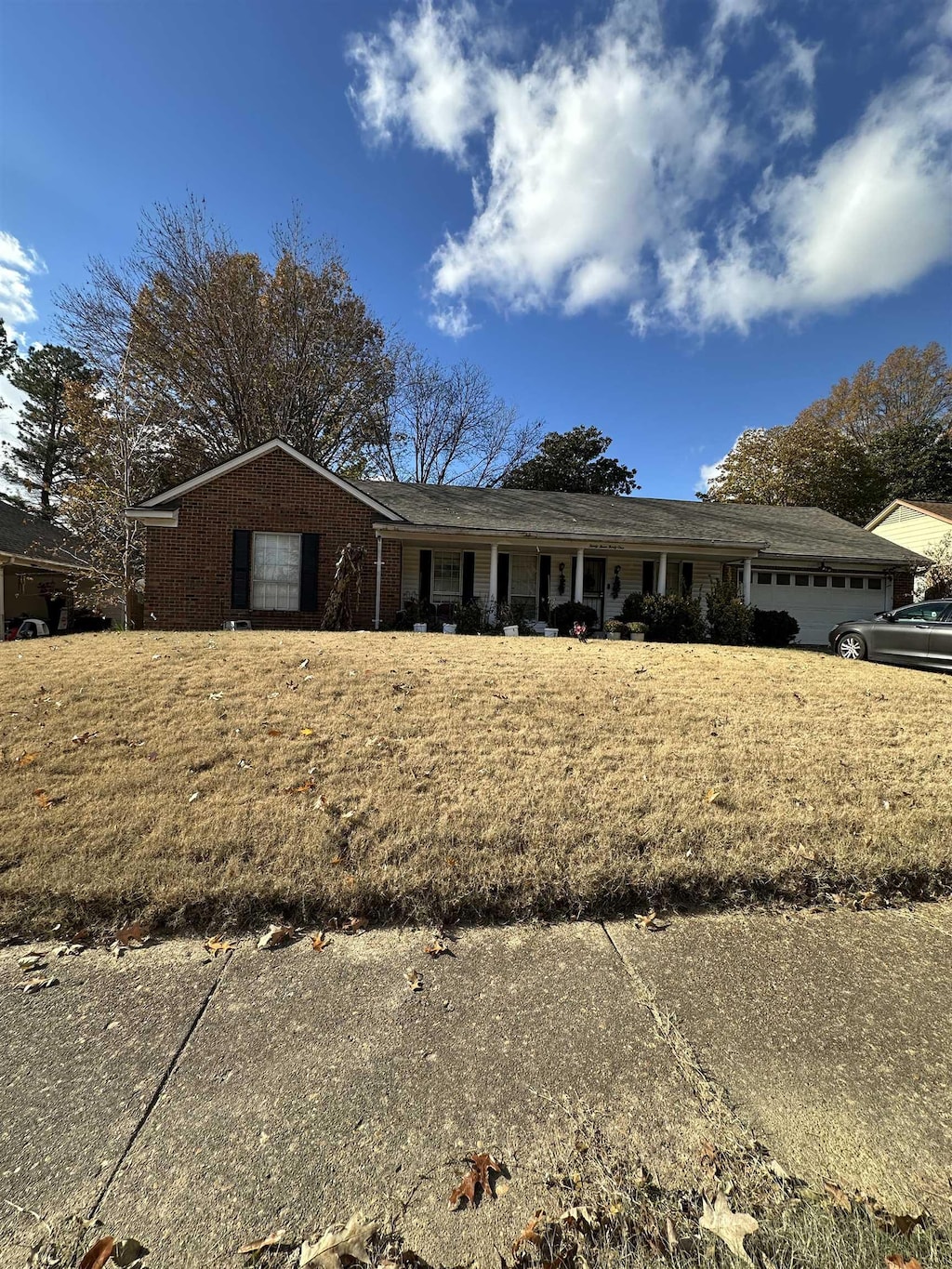 single story home with a garage