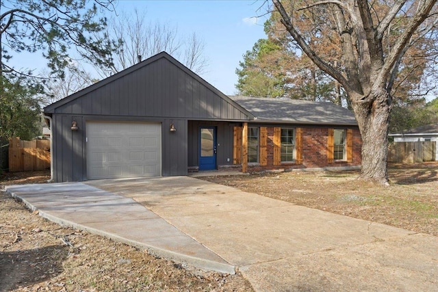 ranch-style house featuring a garage