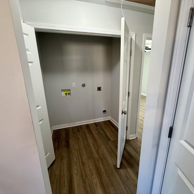 clothes washing area with hookup for a washing machine, hookup for an electric dryer, wood finished floors, laundry area, and baseboards