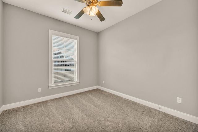 empty room with carpet and ceiling fan