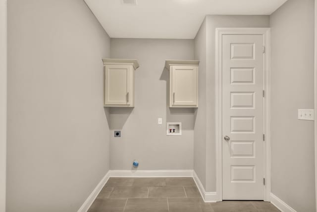 laundry area with hookup for a washing machine, cabinets, and hookup for an electric dryer