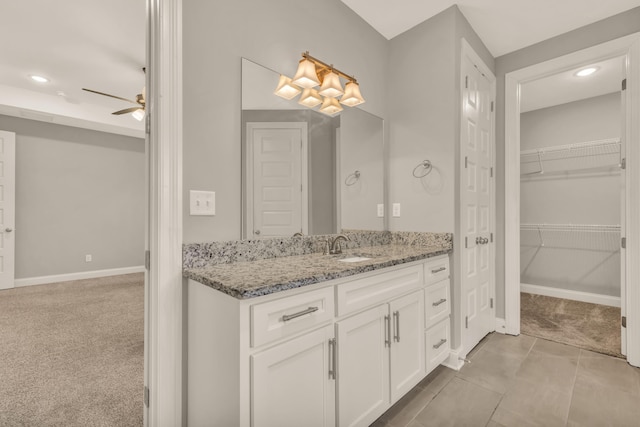 bathroom with vanity and ceiling fan