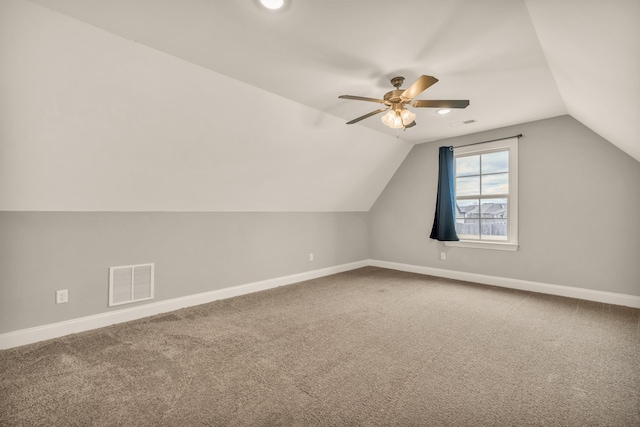 bonus room with ceiling fan, carpet floors, and lofted ceiling