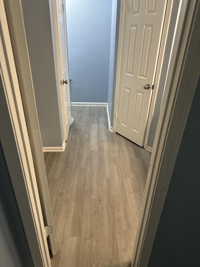 hall featuring light hardwood / wood-style floors