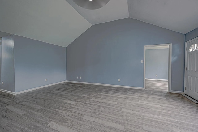 bonus room featuring light hardwood / wood-style floors and lofted ceiling