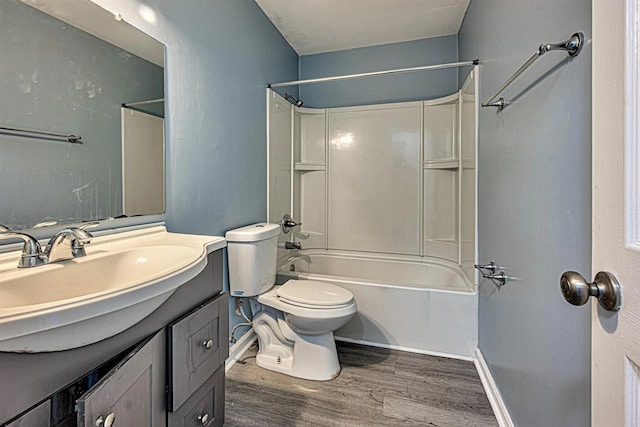 full bathroom featuring shower / bathing tub combination, toilet, vanity, and hardwood / wood-style flooring