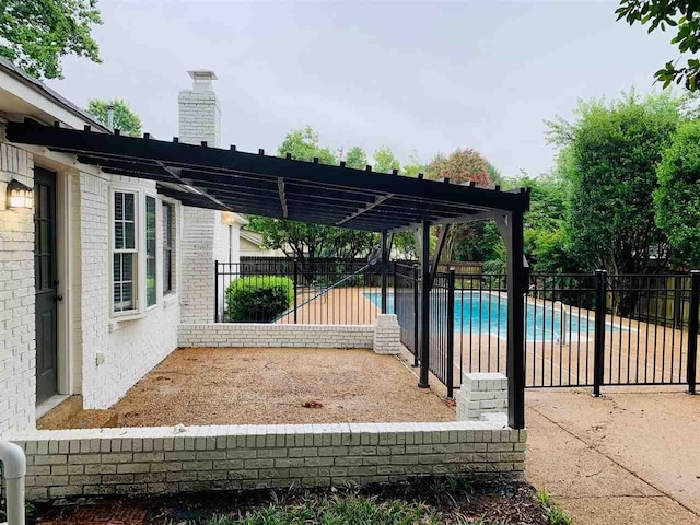 view of swimming pool featuring a patio