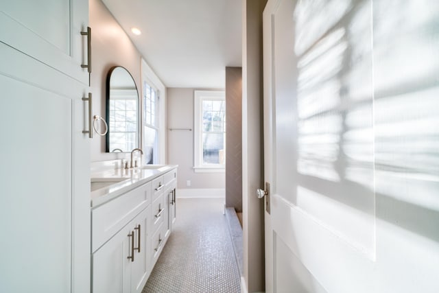 bathroom with vanity and tile patterned floors