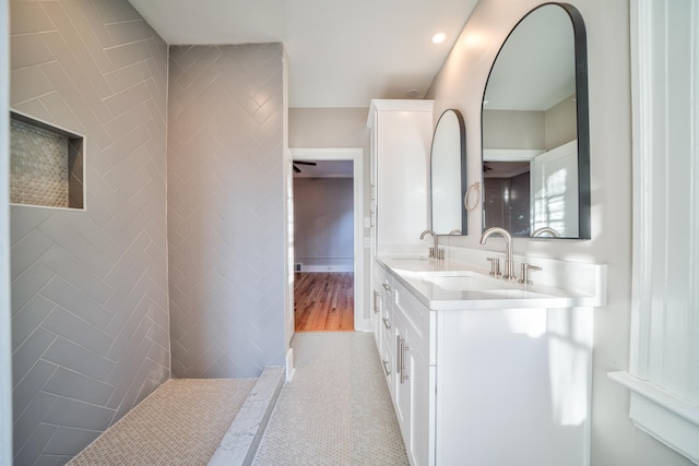 bathroom featuring tile patterned flooring and vanity