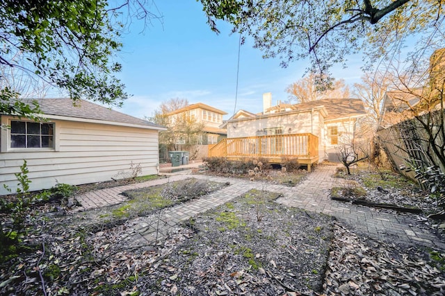 view of yard featuring a wooden deck