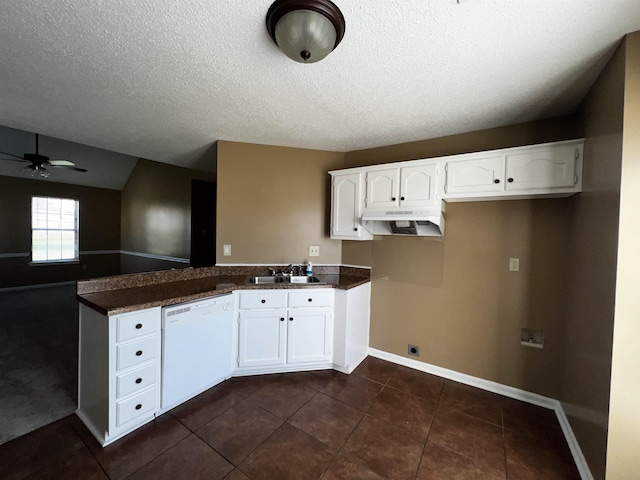 kitchen featuring white cabinetry, white dishwasher, dark tile patterned flooring, and ceiling fan