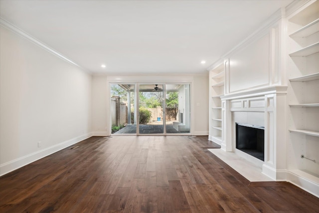 unfurnished living room with ceiling fan, dark hardwood / wood-style flooring, and ornamental molding