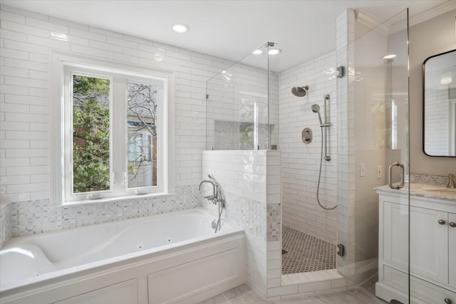 bathroom with tile patterned floors, vanity, and independent shower and bath