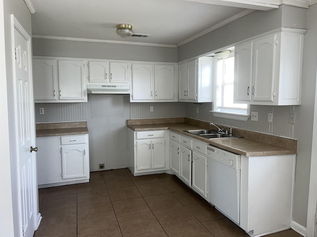 kitchen with sink, white dishwasher, white cabinets, dark tile patterned flooring, and ornamental molding