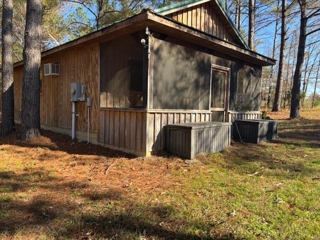6575 Cloverport Rd, Toone, TN 38381 - view of side of home with a lawn