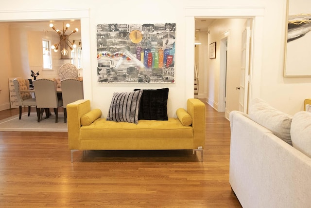 interior space with hardwood / wood-style floors and a chandelier