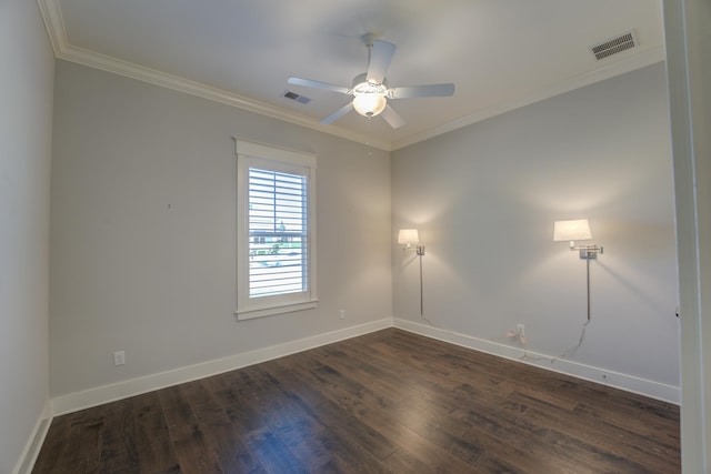 empty room featuring dark hardwood / wood-style floors, ceiling fan, and ornamental molding