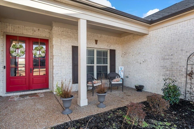 property entrance featuring french doors