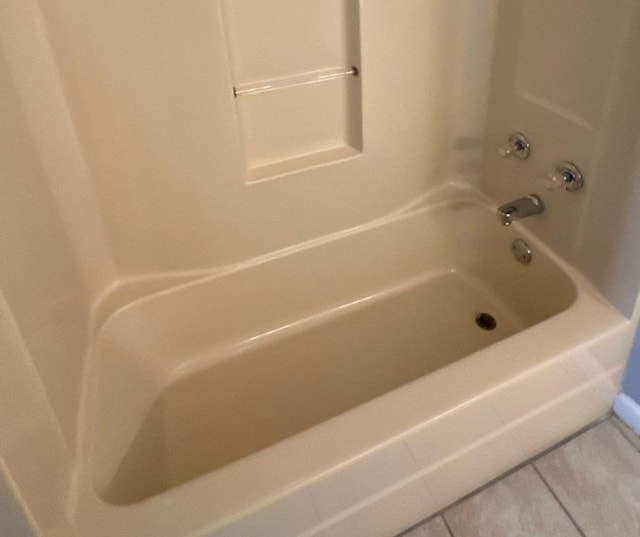 bathroom with tile patterned flooring