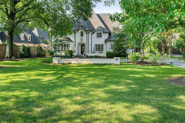 view of front facade with a front lawn