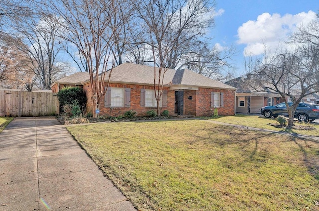 single story home with a front yard