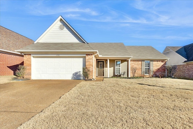 ranch-style house featuring a garage