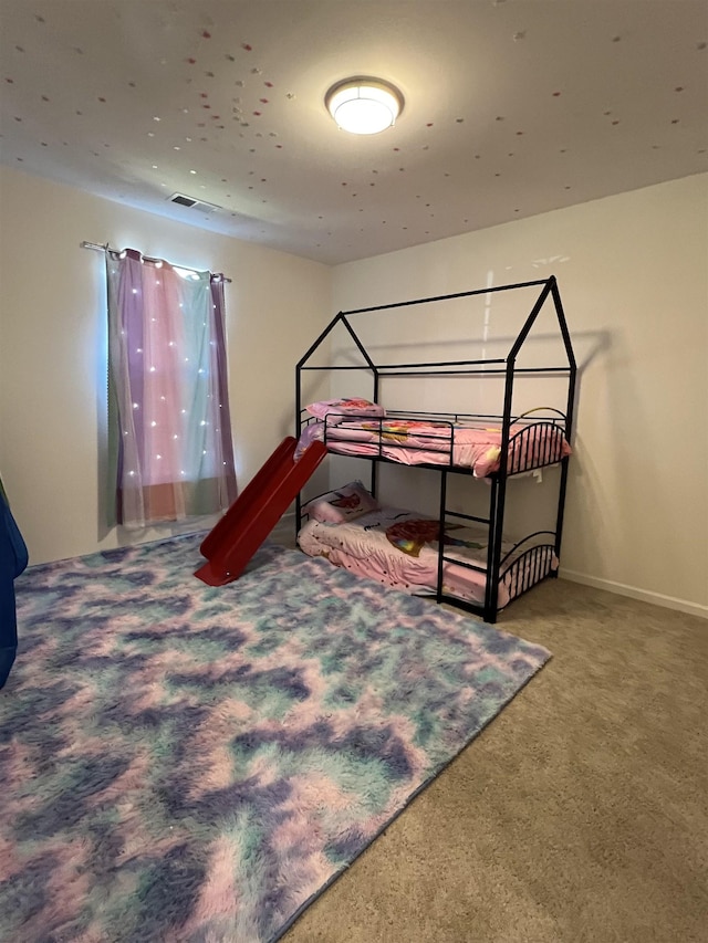 bedroom featuring carpet