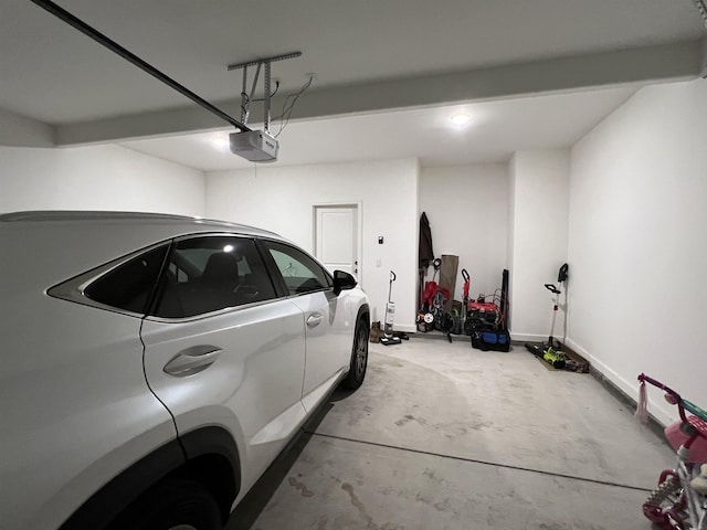 garage featuring a garage door opener