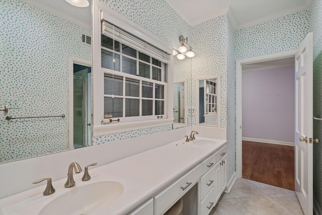 bathroom with vanity, tile patterned floors, and crown molding