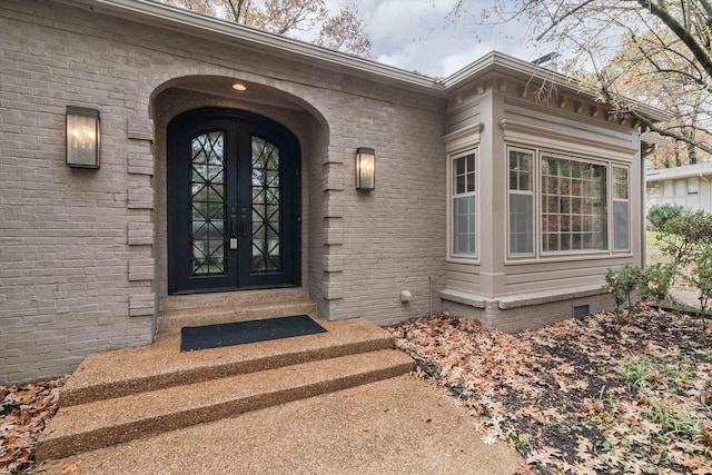 doorway to property with french doors