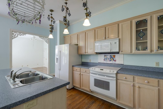 kitchen with ceiling fan, sink, hanging light fixtures, white appliances, and ornamental molding