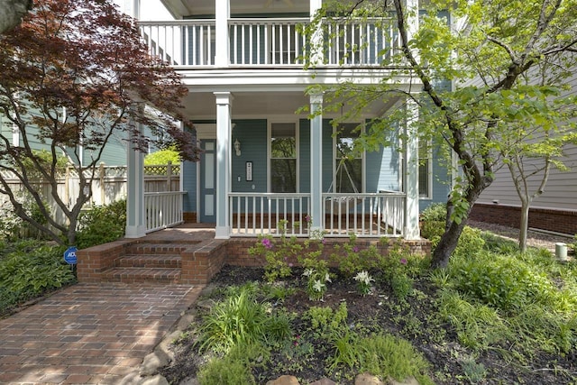 doorway to property featuring a balcony