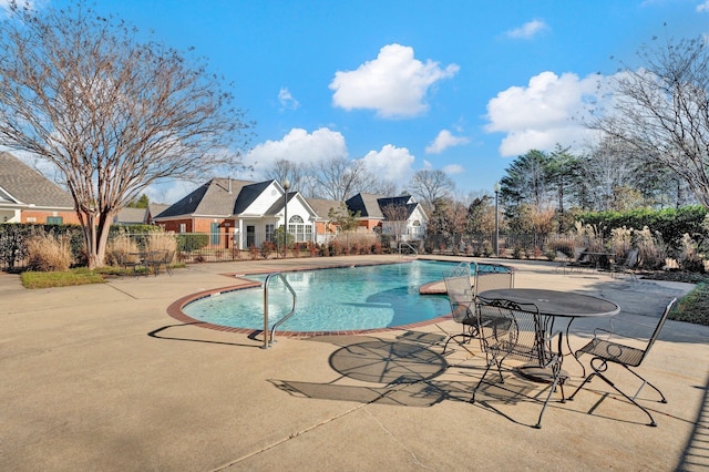 view of swimming pool featuring a patio