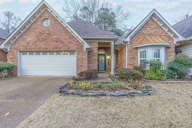 view of front of property featuring a garage