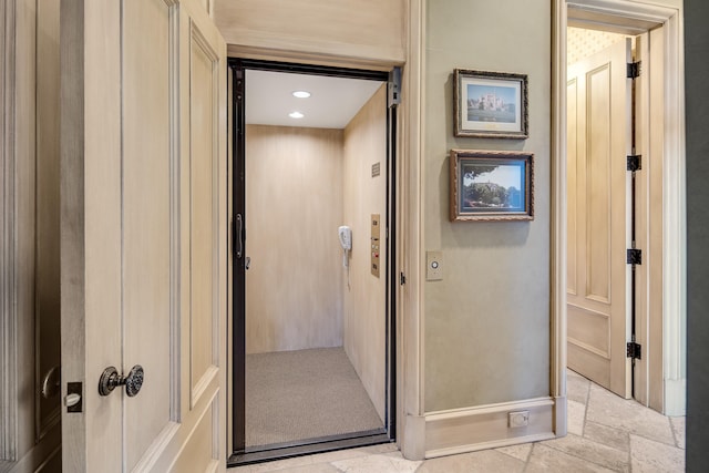 bathroom featuring elevator