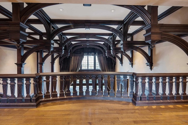 interior details featuring hardwood / wood-style floors and ornamental molding