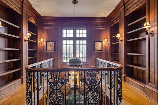 interior space featuring wood walls