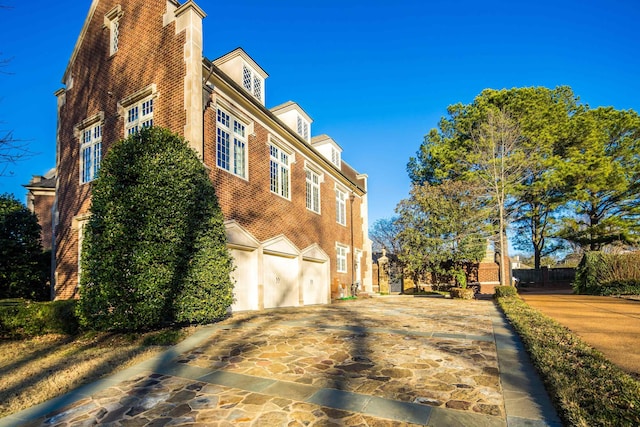 view of home's exterior with a garage