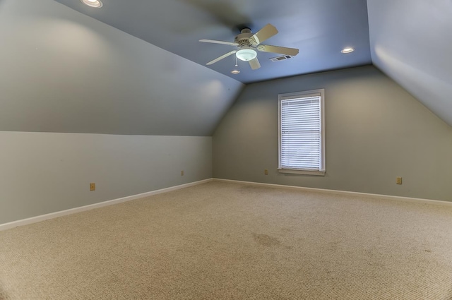 bonus room featuring carpet flooring, vaulted ceiling, and ceiling fan