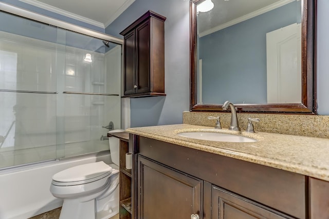 full bathroom with crown molding, toilet, vanity, and combined bath / shower with glass door